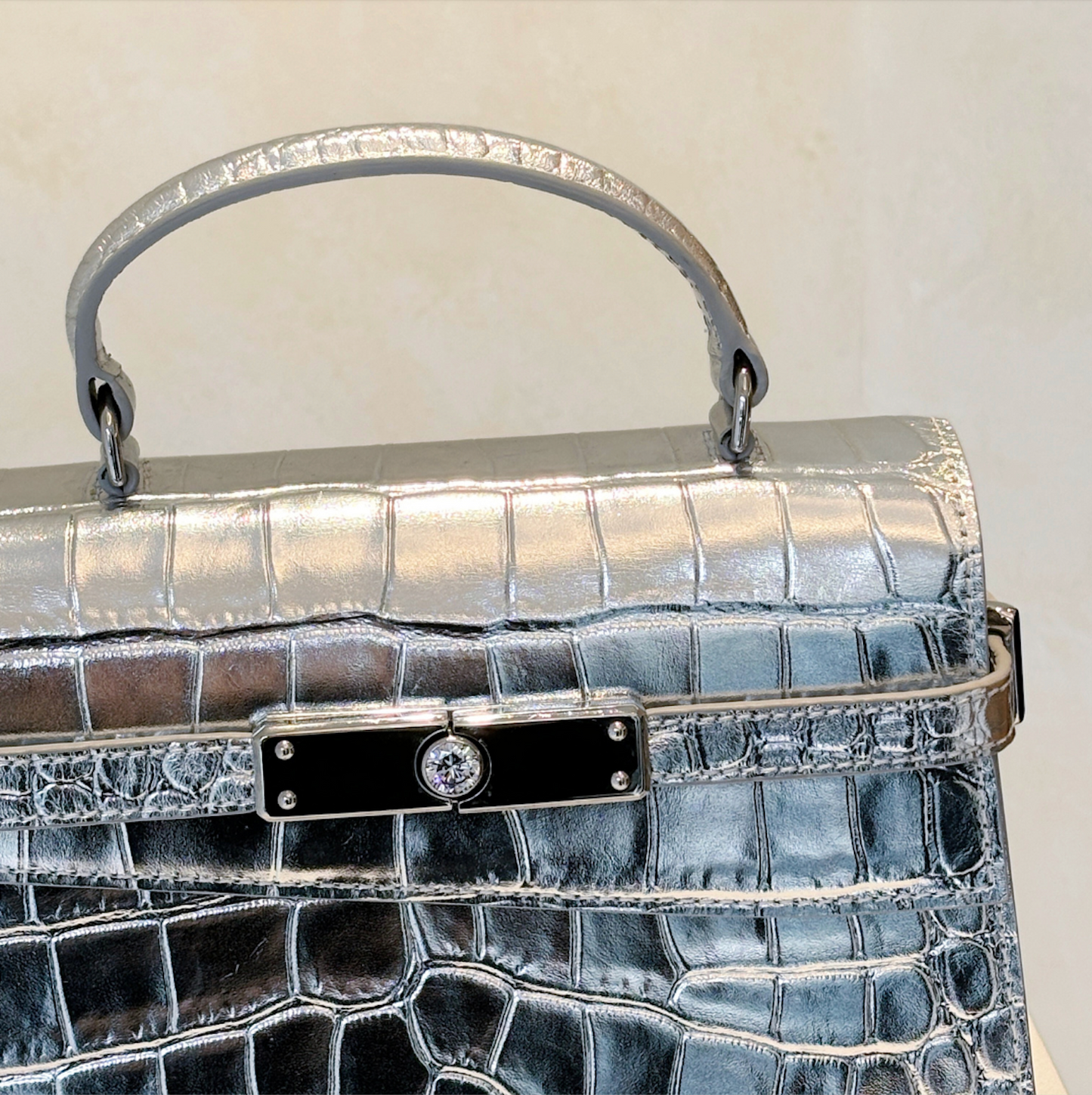 Silver Metallic Top Handle Leather Bag